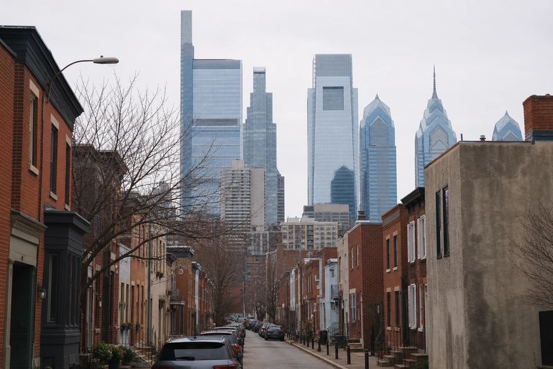 Boathouse Row along the Schuylkill River with the Philadelphia skyline rising behind it